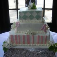 Sort Of Whimsical Cake This was a cake I did that matched wedding invitations. First time using the diamond shapes. I'm going to have to practice more.