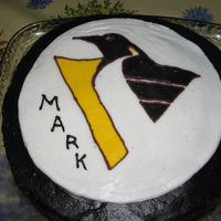 Penguins Hockey Birthday Cake Chocolate frosting and a FBCT for the logo. The birthday boy, my husband's cousin, is a big hockey fan.