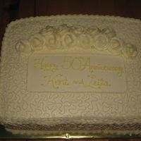 Golden Anniversary Cake My SIL's parents were celebrating their 50th wedding anniversary. Her sisters were planning the party and told my SIL to just, "...