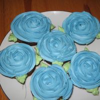 Blue Rose Cupcakes I really liked the pink rose cupcakes jammjenks did, so I tried my hand at some blue ones. Mine are not as pretty as her's, but I love...