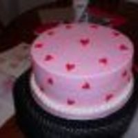 Pink And Red Heart Cake French Vanilla Cake with Buttercream frosting and Strawberry Cream filling. It was awesome!! This is my 3rd cake. I used the paper towel to...