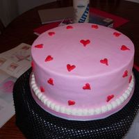 Pink With Red Heart Valentine's Day Cake French Vanilla Cake with Buttercream frosting and Strawberry Cream filling. It was awesome!! This is my 3rd cake. I used the paper towel to...
