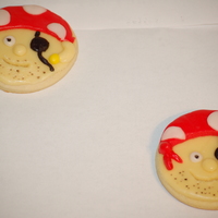 Pirate Cookies Pirate cookies inspired by several cupcakes and cookies I saw posted on this site. No fail sugar cookie with Marshmallow rolled buttercream...