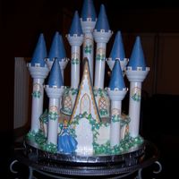 Cinderella's Castle I made this for my daughter's 4th birthday. I used the Wilton Romance Castle Cake Set.