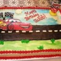 Cars This is a cake I made for a close family friend. It is from the Car Movie. It hink I used a combination of ideas from the Wilton Yearbook...