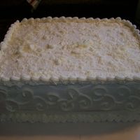White Cake This is an Almond Sour Cream cake with Black Raspberry Filling and White Chocolate Cheesecake Buttercream.