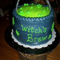 Witch's Brew! This was a simple yellow cake with raspberry filling. It was for a Halloween Party that we had. It turned out okay,