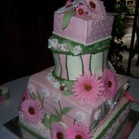 My Last Wedding Cake... finally, my last wedding cake! This was for a wedding yesterday, and it is actually my favorite cake I've done. The flowers are made...