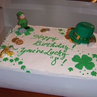 St. Patrick's Bday Cake This was for a co-workers 8 year old son - I was kind of tickled, he insisted on a cake with a leprachaun on it (his bday was March 3). I...