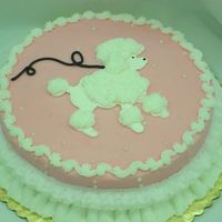 Pink Poodle Cake I made this cake for school. The cake is covered in bc and the poodle is royal icing with bc frosting on it to make it look fluffy. The...