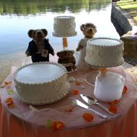 My First Wedding Cake A gift to my friend, her wedding cake. Each cake was layered with cake/rspberry filling/cake/buttercream/cake/lemon filling/cake. Frosted...