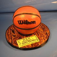 Basketball Cake For Wilson Birthday cake for a man who loves basketball and is named Wilson!Fondant covered cake board and cake.
