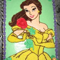 Belle Cake Belle's face and shoulder made from buttercream transfer. Gown and hair made using tip #16.