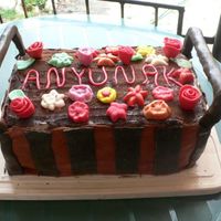 Mother's Day Cake 2007. Flower Box sponge cake with buttercream. covered with marzipan . the top is covered with cocoa powder. Flowers from marzipan