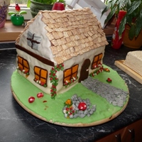 House sponge cake with chocolate buttercream. with marcipan