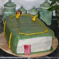 Book sponge cake with chocolate buttercream, covered with fondant.