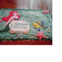 Little Mermaid Cake I did this one for the neighbor girl's Sweet 16 birthday. The characters are made of fondant, and I just sprayed the background with...