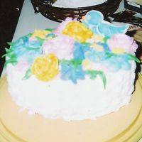 Basket Of Flowers This was my first basketweave cake. Unfortunately, the flash on the camera distracted from the basketweave details so it's hard to...