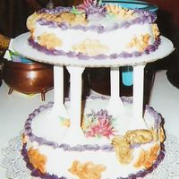 Fall Cake This was my first tiered cake. It was the final project in my Wilton class. It's iced and decorated with buttercream with purple,...