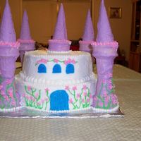 Castle Choc & Vanilla swirl cake w/ buttercream icing. Towers are ice cream cones dipped in almond bark.
