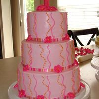 Daughter's 1St B-Day Cake! Made this for my daughters 1st b-day. Bottom layer is french vanilla w/ chocolate BC filling. Middle and top layer are strawberry w/...