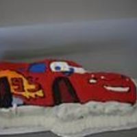Cars Cake I made this for my nephews' 6th birthday. He loved Lightning McQueen. This was a yellow cake made from the Wilton cake pan.