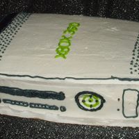 Xbox 360 Birthday Cake Tried my luck at an XBOX 360 cake for the son of a friend.Yellow Cake w/ BC Icing. Kind of a rush, not much time started at 11 ended at 2am...