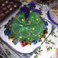 3-D Christmas Tree Cake I did this cake with the same layering effect like I was doing a Barbie cake. I did the green with a star tip and sprinkled with powdered...