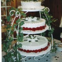 Fresh Red Rose Wedding Cake All layers on this cake are 3" thick with all of them having basket weave on the side.