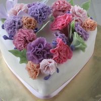 For All The Mothers It's my second fondant cake. All the gum paste carnations are made by me. : )