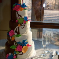 Half Chocolate And Half Vanilla Wedding Cake This is a wedding cake for a very cool bride and groom. :) The bride had the idea of doing the cake half and half and I ended up doing a...