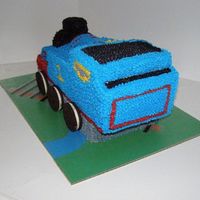 Thomas The Train My first 3D hand carved cake. This is torted vanilla and mocha with coconut BC icing.