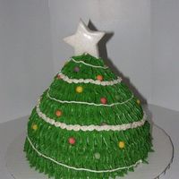 Christmas Tree Cake Inspired by cakes seen here =) I used a 10", 8" and 6" and carved it.