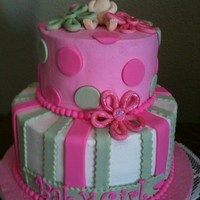 Baby Girl Baby Shower Buttercream with fondant embellishments. Baby made from gumpaste.