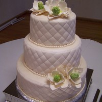 Magnolia Wedding Cake Gumpaste Magnolia's on fondant cake.