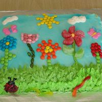 Candy Garden I made this cake for a little girl's birthday. She wanted butterflies, bugs, flowers, and candy. This is what I came up with :)