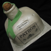 Patron Bottle White velvet cake with strawberry filling, covered in fondant. The neck and cork are RK. Hand painted. This was for a friends 21st birthday...