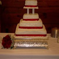 Amy's Cake This was my first "official" wedding cake. Well, my first paid one anyway. It is White cake with Butter Cream Icing. Around each...