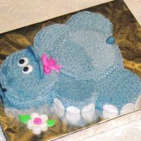 Hippo This was a hippo I made for a friend who is obsessed with hippos...haha. I made it with chocolate and vanilla cakes. I covered it in...