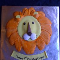 1St Bday Lion Cake White Vanilla Cake w/ Vanilla Buttercream. Fondant for face and mane. I textured the fondant, painted it with a deep orange and then wiped...