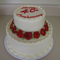 40Th Anniversary This is a two tiered carrot cake I did for a 40th Anniversary celebration. The customer requested red.