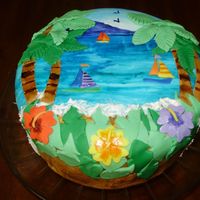 Sailboats And Palm Trees This cake is painted fondant that is decorated to match the cakes for the birthday party.