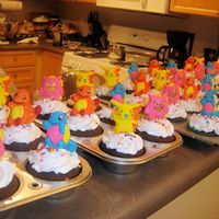 Pokemon Cupcakes Edible Pokemon tops, chocolate cups with marshmallow frosting