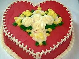 My First Attempt At Buttercream Roses..aaggghhhh! A valentine for my neighbor'swife to get him out of hot water..lol...I figured i would do it as a practice cake for flowers. The roses...