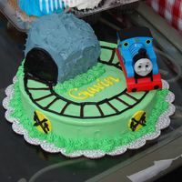 Thomas The Train Cake This is cream cheese icing. The whole thing is a big smash cake. You should have seen the lovely shades of gray and green that were in his...