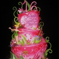 Tink's Fantasy Sweet 16 Designed for a sweet 16 party.....The cake is layers of red velvet w/amaretto cream cheese, triple chocolate w/ raspberry mousse and yellow...