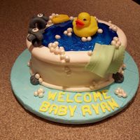 Rubber Duckie, You're The One! Cake for a baby shower this past weekend - the faucet handles actually worked and turned!! Fondant covered cake - wilton shimmer gel for...