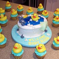 Duckie Cake With Coordinating Cupcakes The cupcakes that we did to supplement the cake. Each child got to take home their own rubber duckie!