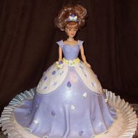 Purple Princess Made for my friend's daughter's birthday. Fondant w/royal icing flowers.