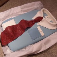 Dad's 61St Birthday Cake Made this for my father's 61st birthday this weekend (hence the LXI on the "tag"). Dark chocolate fudge cake with mint...